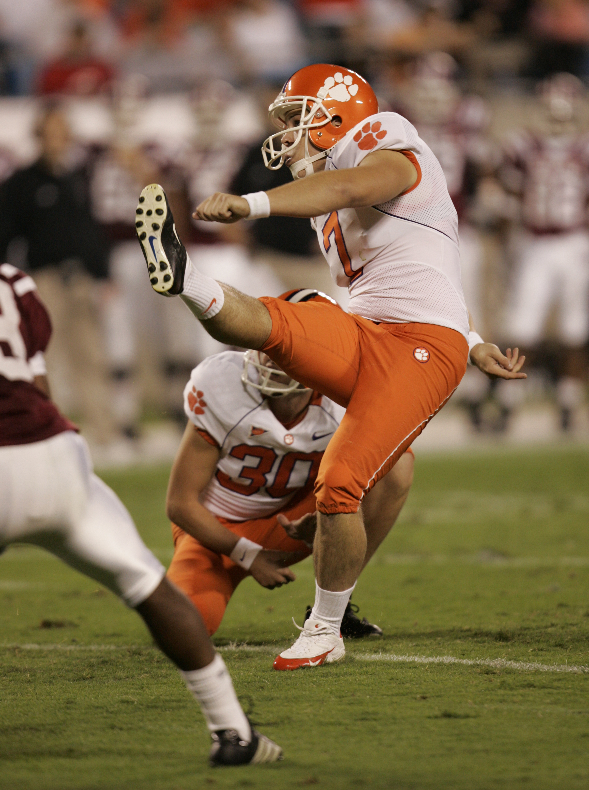 Jad Dean kicks for Clemson University in 2006.